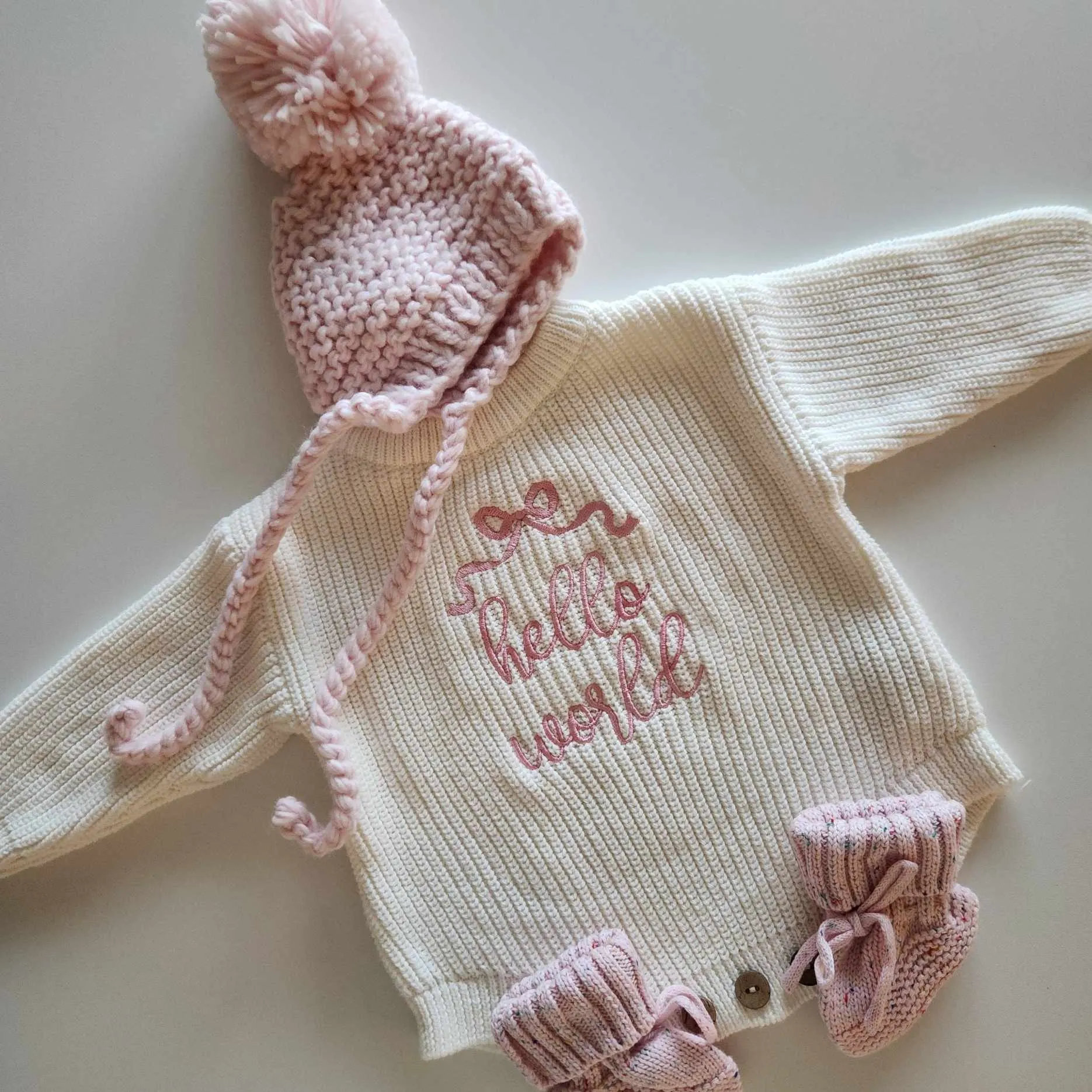 EMBROIDERED BOW ROMPER