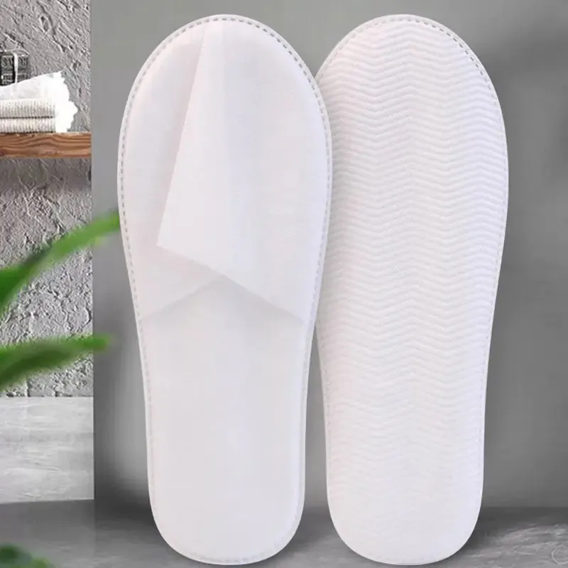 "12 Pairs of Plush Disposable Spa Slippers for Hotels"