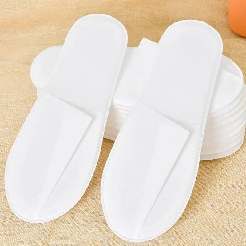 "12 Pairs of Plush Disposable Spa Slippers for Hotels"