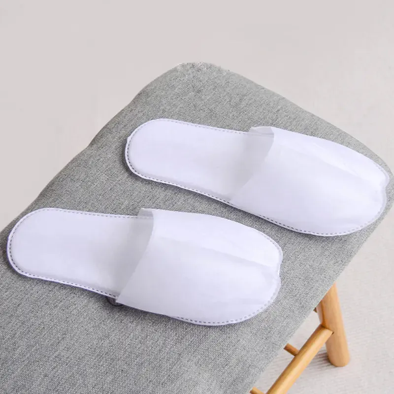 "12 Pairs of Plush Disposable Spa Slippers for Hotels"